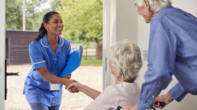 An engaged home health aide reports to the home of a client.